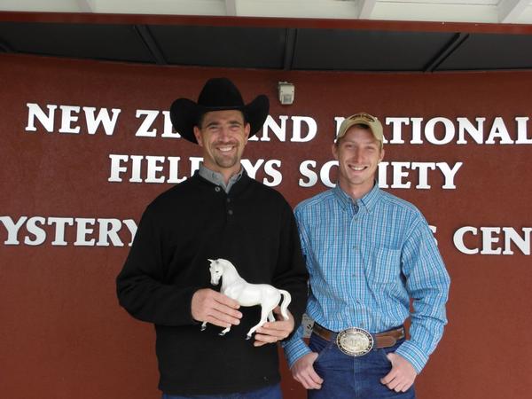 Josh Lyons (left) holding Equidays mascot, Casper (grey horse).